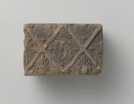 Fireplace with a mask in a profiled diamond
