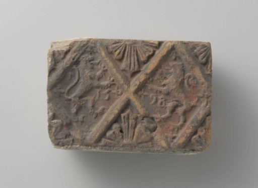 Fireplace tile depicting two climbing lions, placed in two panels