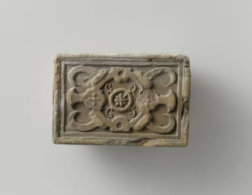 Fireplace with an Octagonal Cartouche