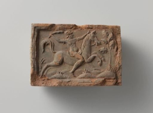 Fireplace surround depicting a rider with a club on a galloping horse