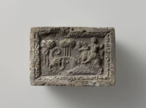 Fireplace Depicting a Knight Fighting a Dragon