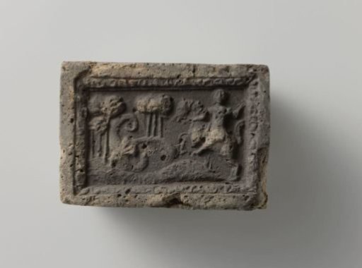 Fireplace with a representation of a knight (Saint George?) fighting a dragon
