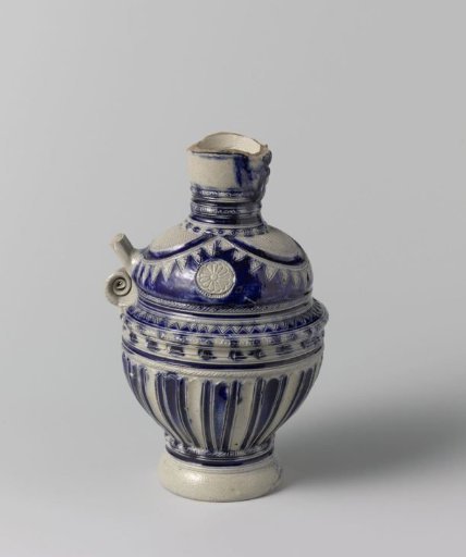 Fragment of a jug with ornamental borders, flowers and a lion's head