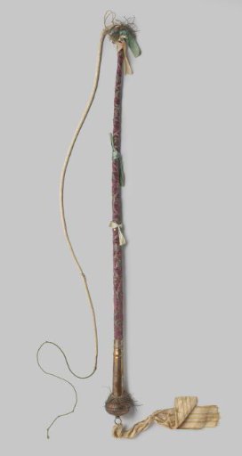 Riding whip covered with purple velvet, with leafy vines embroidered in silver thread, with silver spherical knob and long cord of white leather