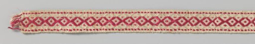 Silk ribbon with a red and white checkered and dotted pattern