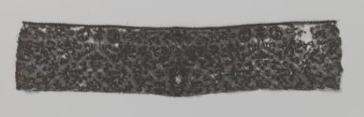Strip of black bobbin lace with symmetrical compositions with tulips and roses