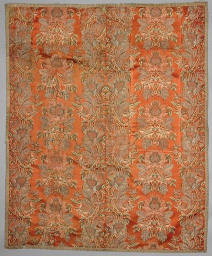 Salmon-colored silk cloth with a floral pattern and metallic thread