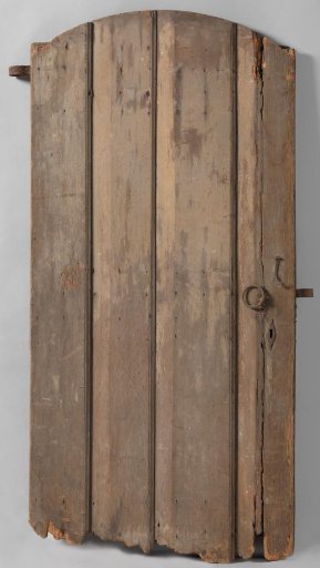 Door consisting of four planks, held together at the back by three clamps