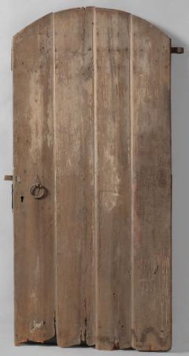 Door consisting of four planks, held together at the back by three clamps
