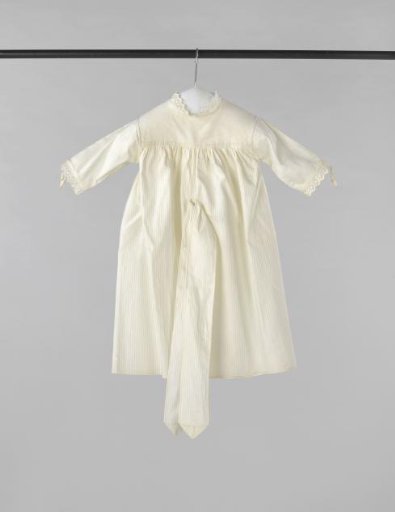 Children's dress with short sleeves, round neck and ribbon sash of white cotton with woven stripes, trimmed with English embroidery