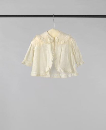 Children's jacket or coat with a lying round collar of thin white cotton with pinking, trimmed with ruffles of English embroidery