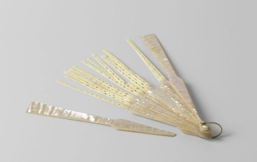Mother-of-Pearl Mount with a Relief Floral Motif and a Pierced Bone Support