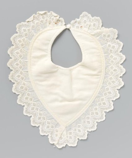 Shawl with point shape with woven crystal-shaped scatter motif, a white embroidered leaf vine and edged with a scalloped border of English embroidery; flannel backing