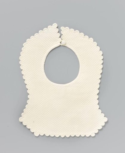 Piece of white linen (?) with piqué and a carved festooned border; the corners extend downwards at the bottom