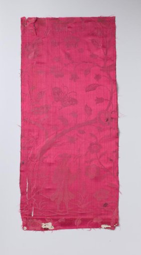 Fragment of fuchsia pink silk satin