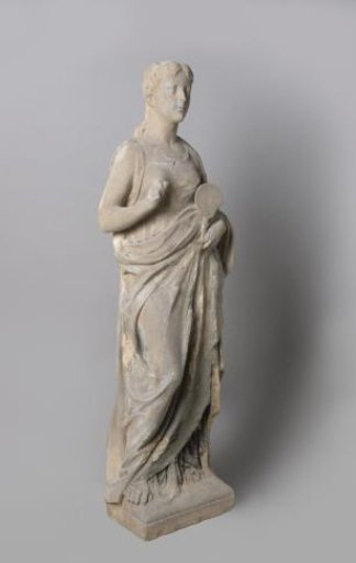 Full-length female figure, holding a mirror. From the facade of the Rijksmuseum villa
