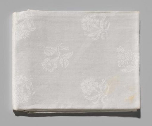 Linen damask napkin with floral motifs