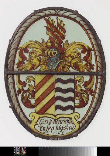 Shield with wings and swords as crest and inscription "Gerrit Henricksz and his wife 1621"