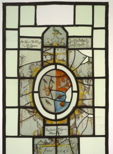 Pane with a coat of arms featuring an ox's head, birds, bells, a climbing lion, and inscriptions