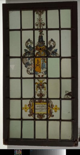 Diamond with a coat of arms featuring a helmeted man as a crest and inscription "Catharina Veddermans, 1638"