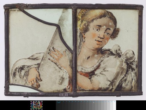 Lozenge with head, shoulders and arms of a female figure