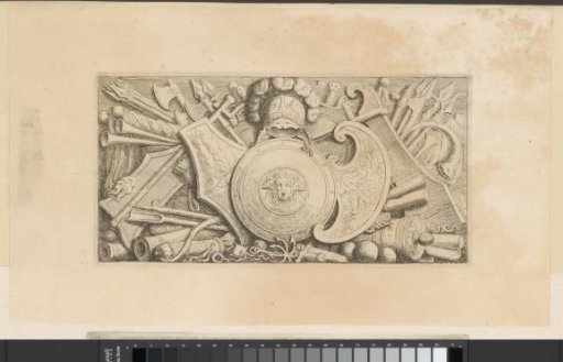 Relief with coats of arms and military equipment in the Town Hall on the Dam