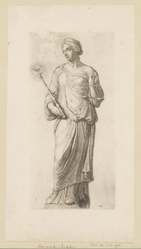 Statue of Justitia (Justice) on the facade of the Town Hall on the Dam