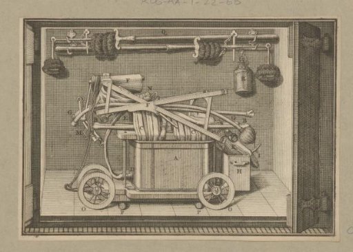 Hose reel fire engine and pump stored in a fire engine house