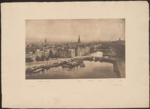 View of the Damrak and the Oude Kerk from Amsterdam Central Station
