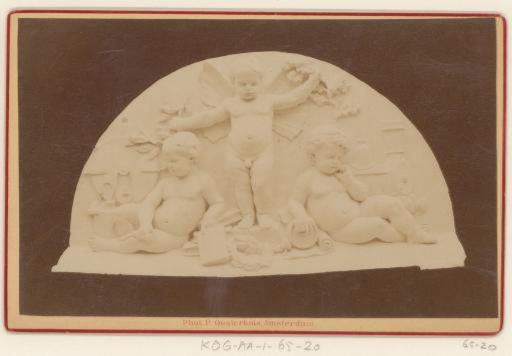 Frieze on the Facade of the Droogbak, with Three Putti and a Steam Locomotive
