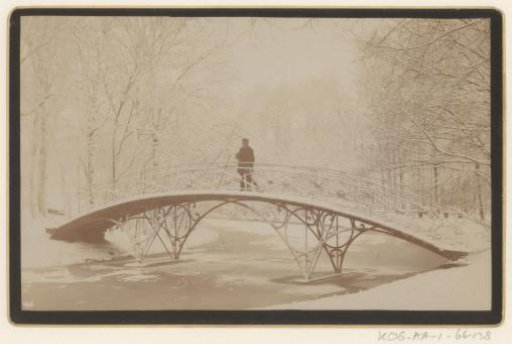 View of a bridge in Vondelpark, Amsterdam, in the snow