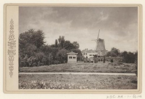 View of De Wolf Mill from Vondelpark in Amsterdam