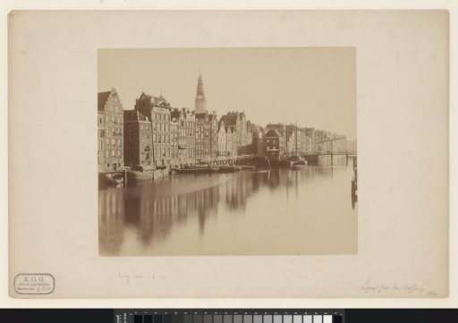 View of the Damrak and the church tower of the Oude Kerk