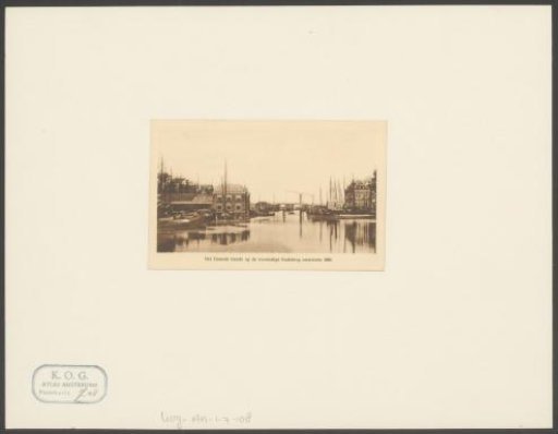 View of the Damrak with the Oudebrug