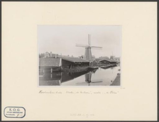 View of the Kostverlorenkade with Windmills De Eenhoorn and De Otter