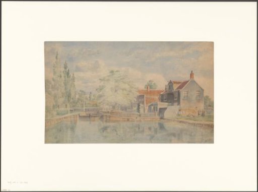 View of houses along a canal in the vicinity of Amsterdam