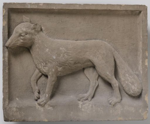 Gable stone with fox or wolf