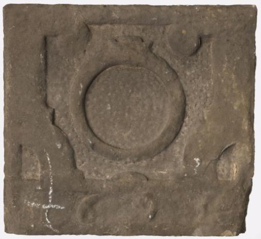 Gable stone with a ring within a frame. Year 16..(?).