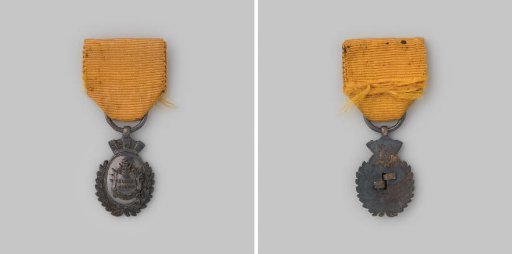 Decoration for honorable, long and actual service in the civic guard for non-commissioned officers and lower ranks, worn by Mr. W.K. van der Breggen, member of the civic guard council in Amsterdam