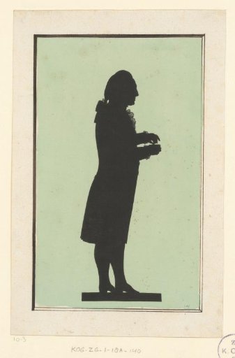 Silhouette Portrait of an Unknown Standing Man with Hands Together