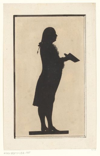 Silhouette Portrait of an Unknown Standing Man with Open Book
