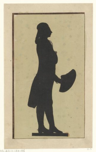 Silhouette portrait of an unknown standing man with a knife in his hand