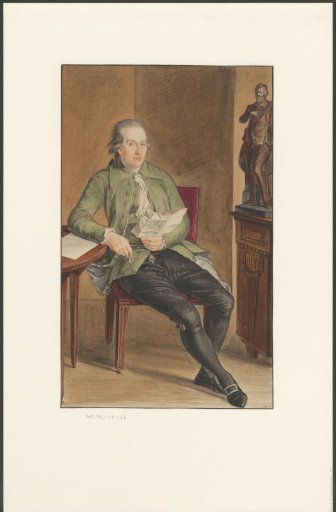 Man reading a letter at a table