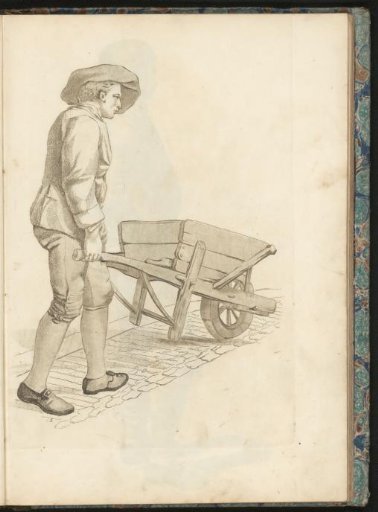 Man pushing a wheelbarrow