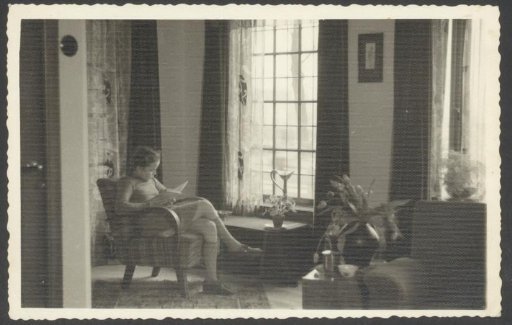 Interior with a reading girl