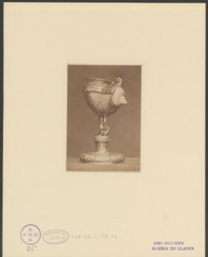 Drinking cup with snail shell