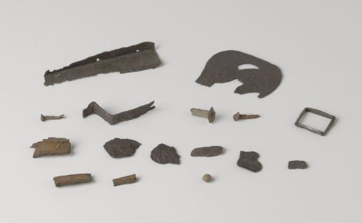 Box with thirteen pieces of iron and three pieces of wood