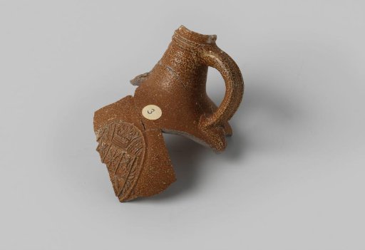 Fragment of a bearded man jug from the VOC ship 'Witte Leeuw'