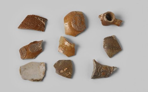 Bag with nine fragments of stoneware from the VOC ship 'Witte Leeuw'