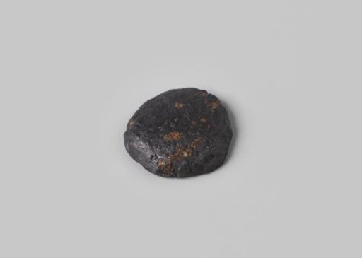 Disc shaped weight, lead,  from the wreck of the Dutch East India ship Hollandia